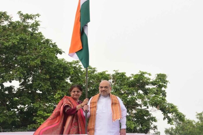 Amit Shah hoisted the tricolor with his wife on Saturday morning
